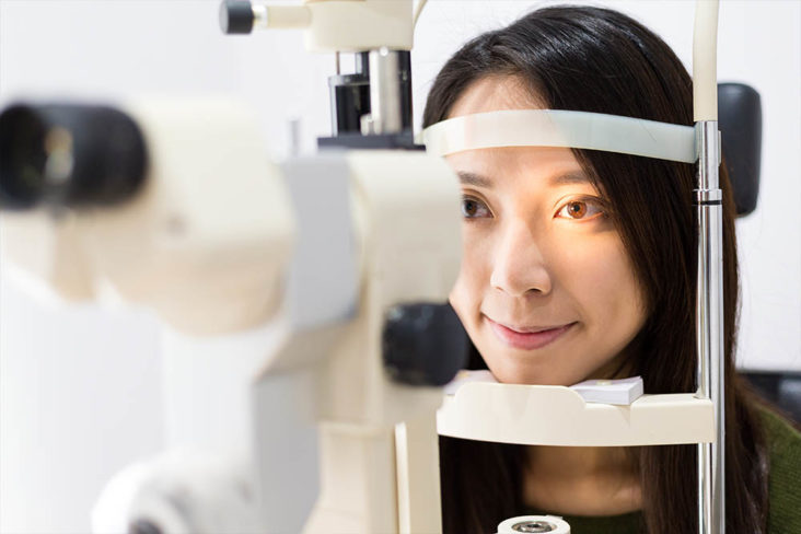 woman getting eye exam